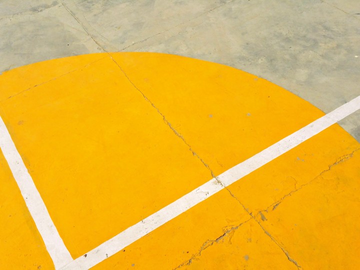 gray-concrete-pavement-with-yellow-and-white-paint-273786